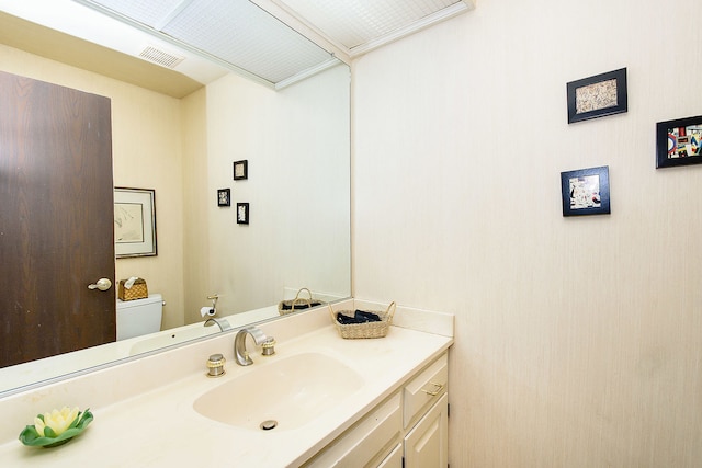 1385 Montgomery Dr, Deerfield, IL 60015 - half bathroom featuring vanity and toilet