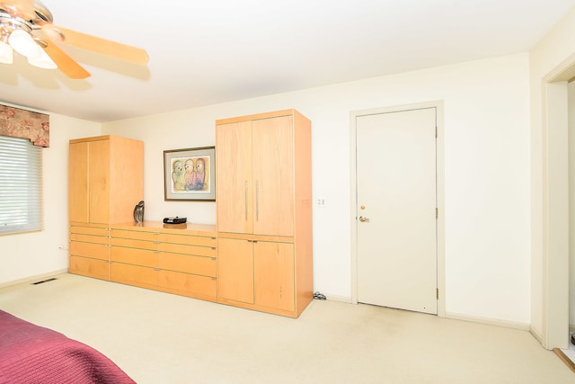1385 Montgomery Dr, Deerfield, IL 60015 - bedroom with light colored carpet and ceiling fan