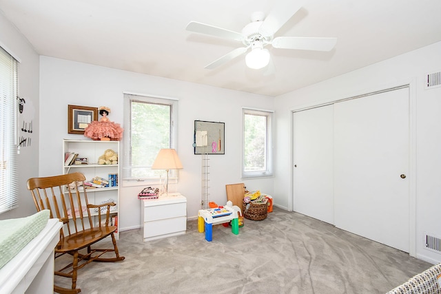 1385 Montgomery Dr, Deerfield, IL 60015 - recreation room with carpet floors, healthy amount of natural light, and a ceiling fan