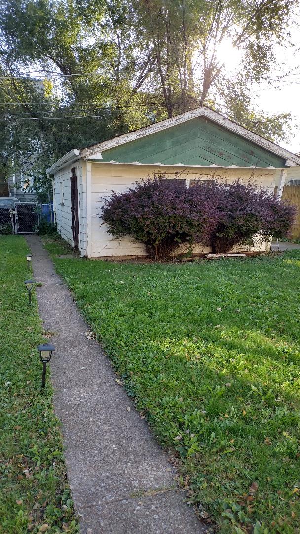 view of home's exterior featuring a yard