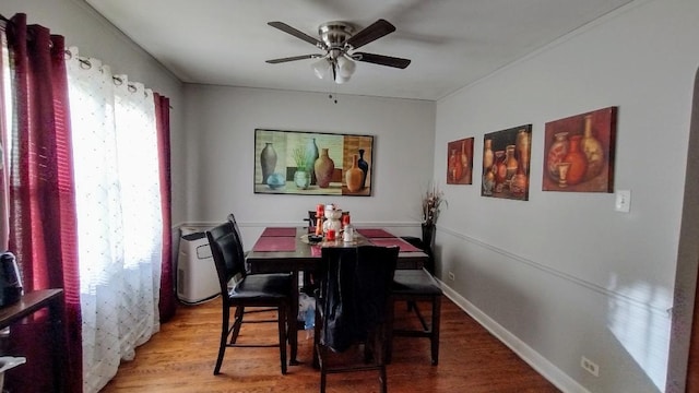 dining area featuring hardwood / wood-style flooring, ceiling fan, and plenty of natural light