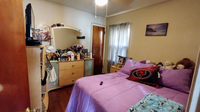 bedroom featuring dark hardwood / wood-style floors