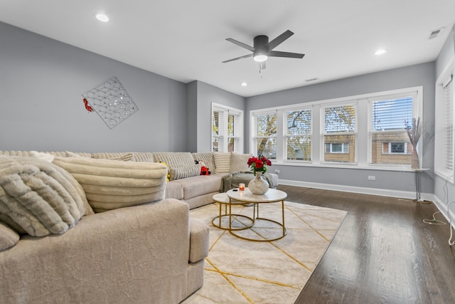 living room with hardwood / wood-style flooring and ceiling fan