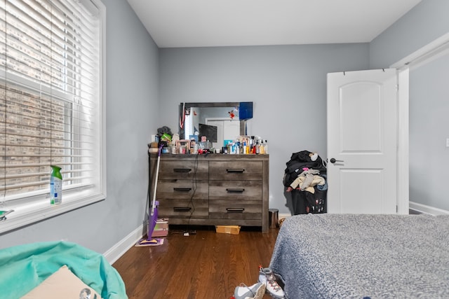 bedroom featuring dark hardwood / wood-style floors