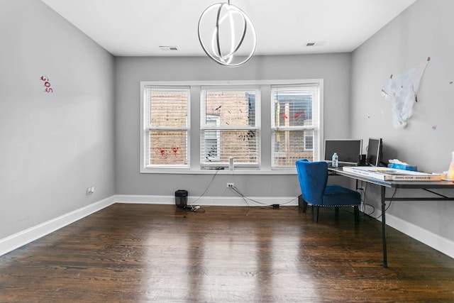 home office featuring dark hardwood / wood-style flooring and a wealth of natural light