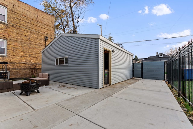 exterior space with an outdoor fire pit