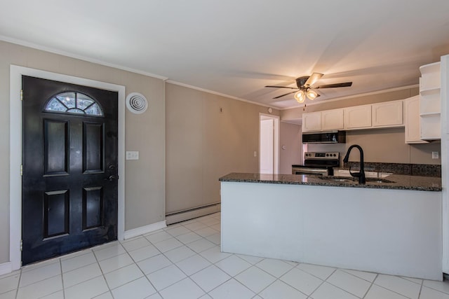 111 E 3rd St, Prophetstown, IL 61277 - kitchen featuring appliances with stainless steel finishes, a baseboard heating unit, a sink, a peninsula, and crown molding