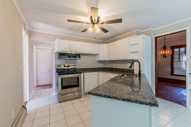 111 E 3rd St, Prophetstown, IL 61277 - kitchen with appliances with stainless steel finishes, a sink, a baseboard heating unit, white cabinets, and ornamental molding
