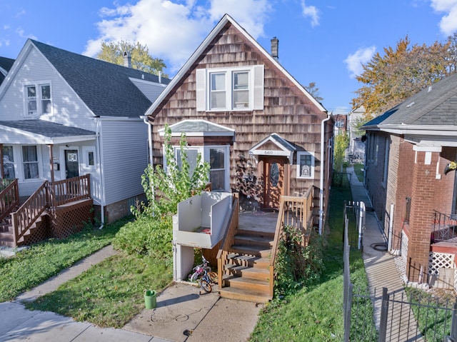 view of front of home with a wooden deck