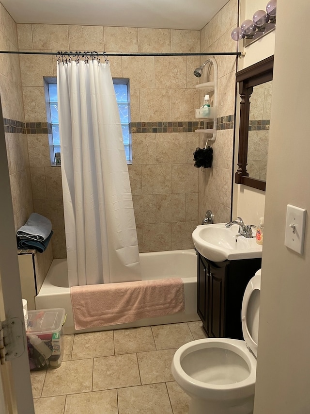 bathroom featuring shower / bath combo, vanity, and tile patterned floors