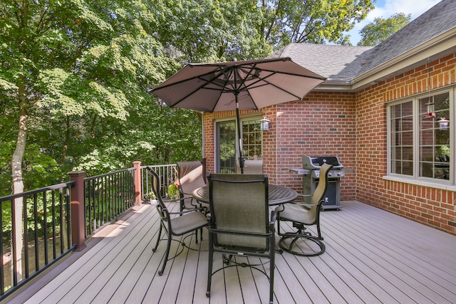 wooden deck with grilling area