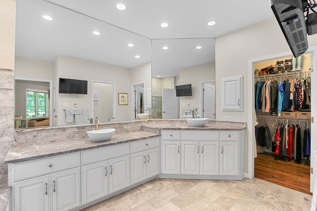 bathroom featuring hardwood / wood-style floors and vanity