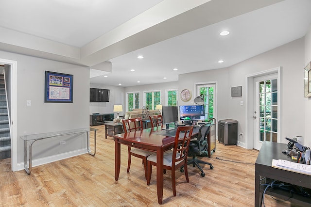 dining area featuring light wood-type flooring