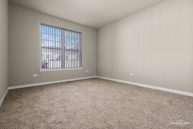 view of carpeted spare room