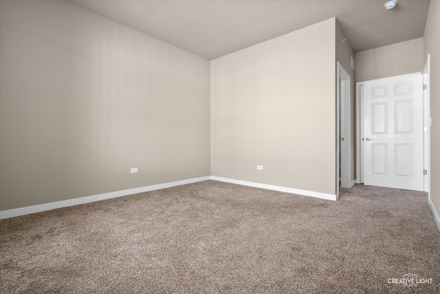 spare room with carpet floors