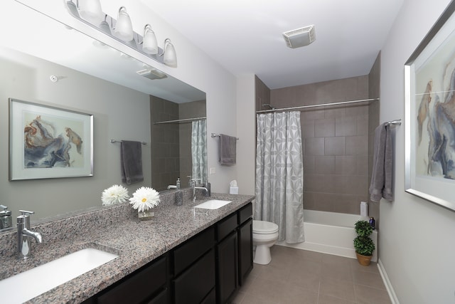 full bathroom with toilet, vanity, tile patterned floors, and shower / bath combo with shower curtain