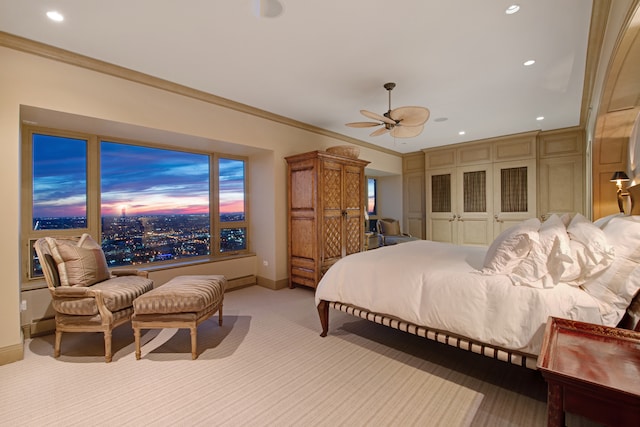 bedroom with ornamental molding, light carpet, and ceiling fan