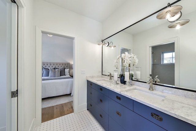 bathroom featuring vanity and wood-type flooring