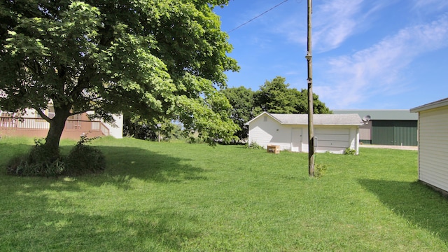 view of yard with a garage