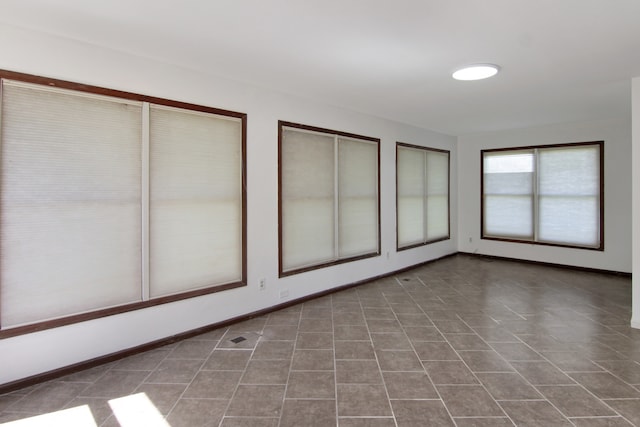 interior space with dark tile patterned floors