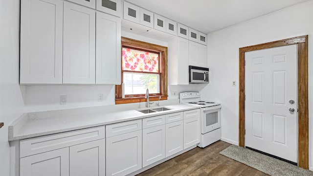 kitchen featuring white cabinetry, dark wood-type flooring, sink, and white electric stove