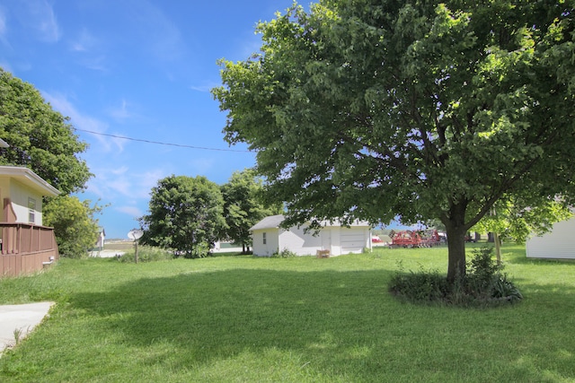 view of yard featuring a garage