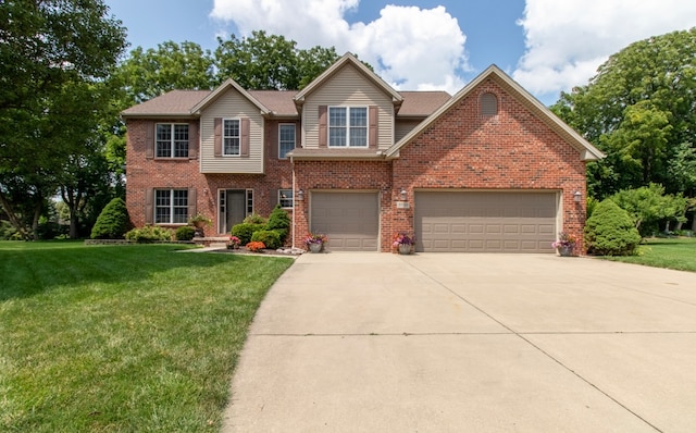 view of front of home featuring a garage and a front yard