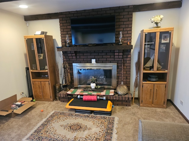 living room with a fireplace and carpet flooring