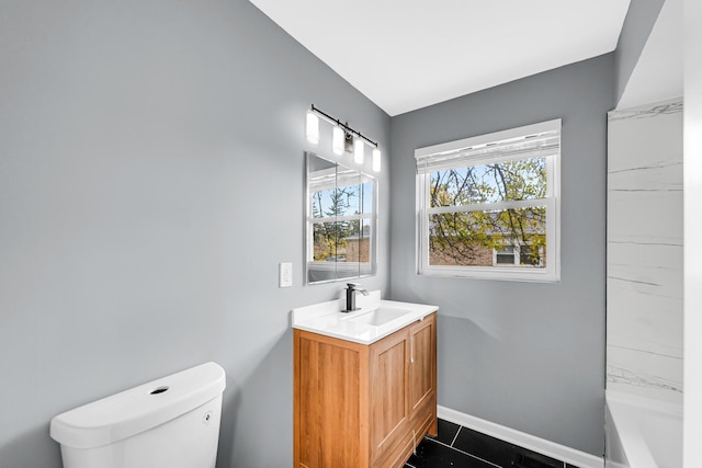 bathroom featuring baseboards, a shower, toilet, a tub, and vanity