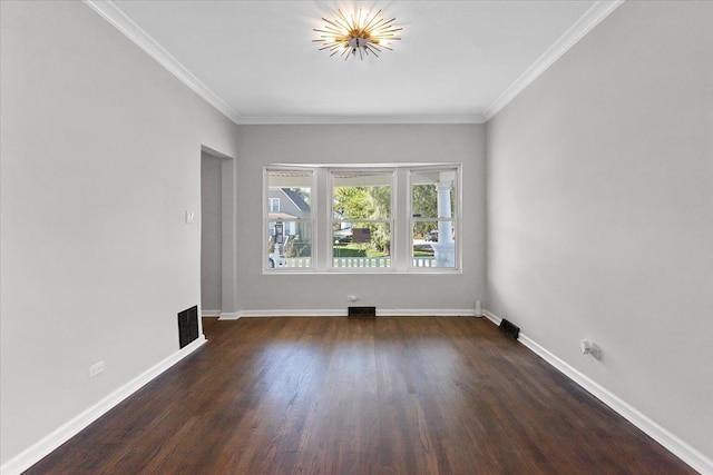 empty room with dark wood-type flooring and ornamental molding