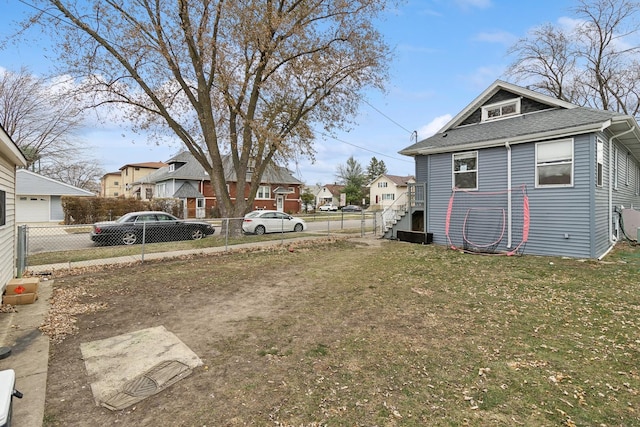 view of property exterior featuring a lawn