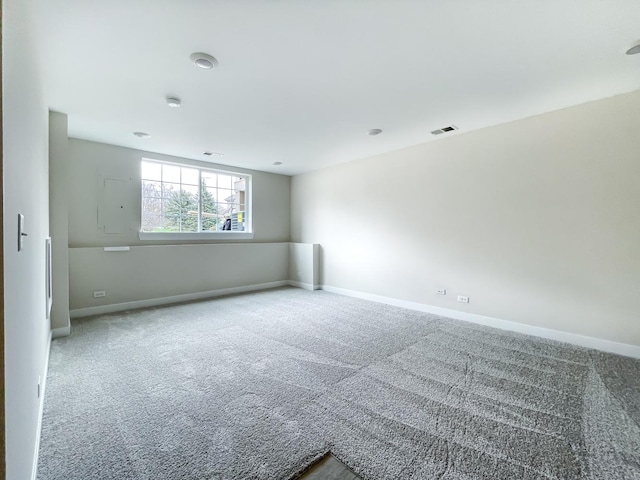 235 Regency Ct Unit B, Wauconda, IL 60084 - unfurnished room featuring baseboards and carpet flooring