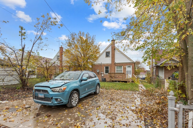 view of front of house with a wooden deck