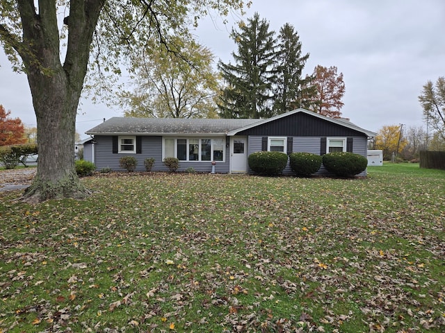 ranch-style home with a front yard