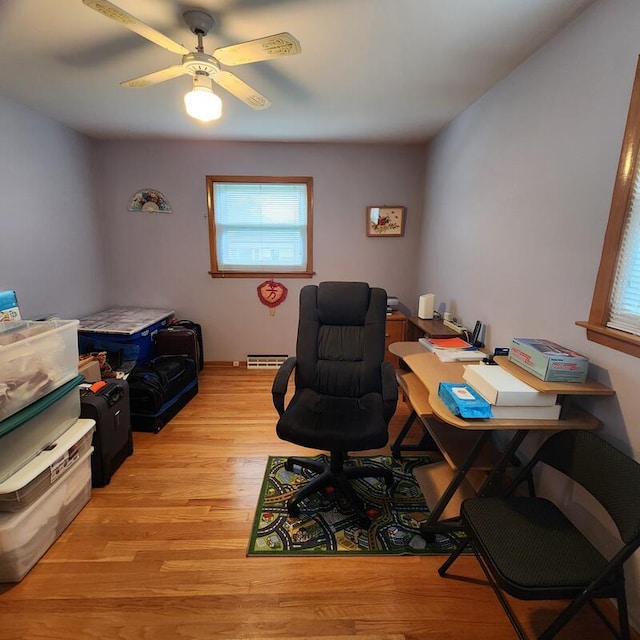 home office featuring ceiling fan and light wood-type flooring