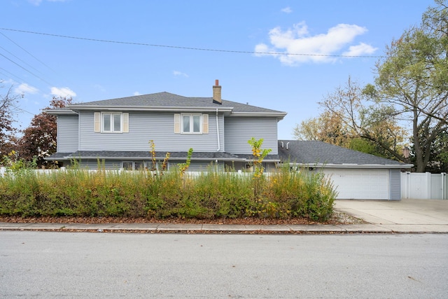 view of side of home featuring a garage