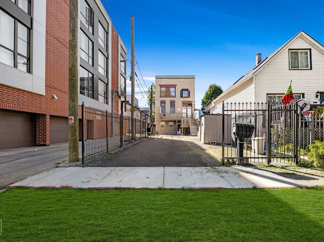 view of home's community with a lawn