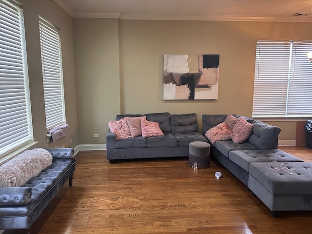 living room featuring ornamental molding and hardwood / wood-style floors