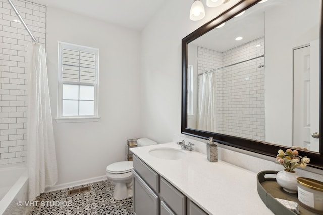 full bathroom with toilet, vanity, tile patterned floors, and shower / bathtub combination with curtain