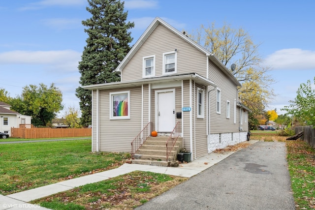 view of front of property with a front yard