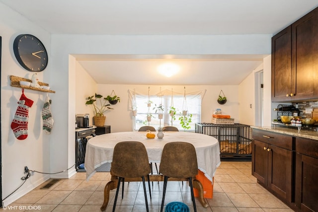1316 S 8th Ave, Maywood, IL 60153 - dining room featuring light tile patterned floors