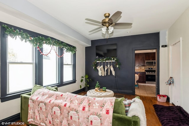 1316 S 8th Ave, Maywood, IL 60153 - living area with ceiling fan and wood finished floors