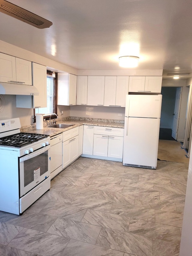 kitchen featuring white appliances, white cabinetry, and sink