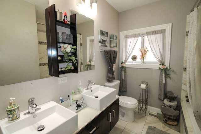 bathroom with walk in shower, tile patterned flooring, vanity, and toilet