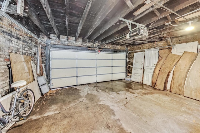 garage featuring a garage door opener