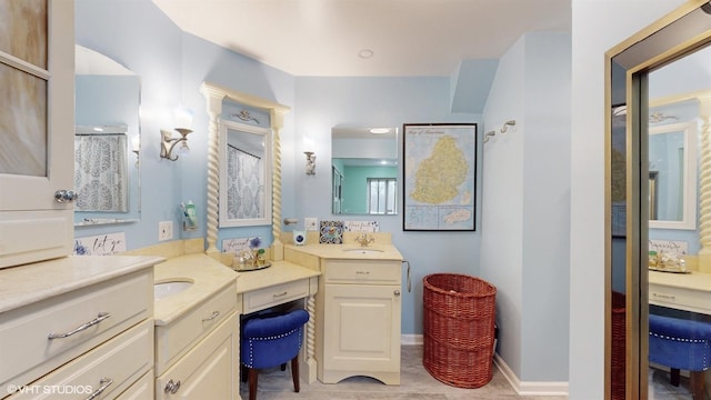 704 Lorraine Cir, Highland Park, IL 60035 - bathroom with vanity and baseboards