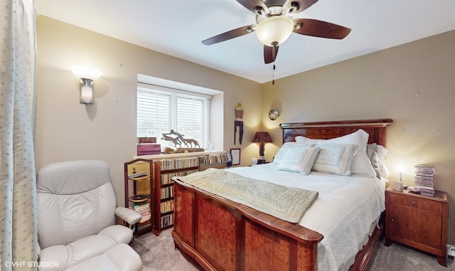 704 Lorraine Cir, Highland Park, IL 60035 - bedroom with light carpet and a ceiling fan
