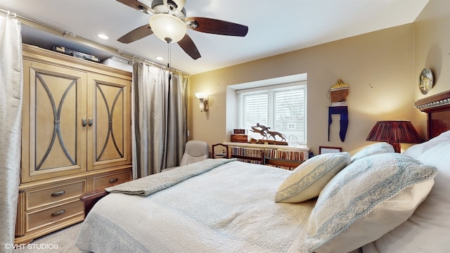 carpeted bedroom with ceiling fan