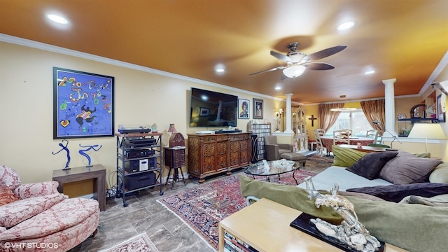 living room with ceiling fan, crown molding, and decorative columns