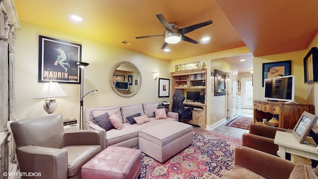 living room featuring ceiling fan